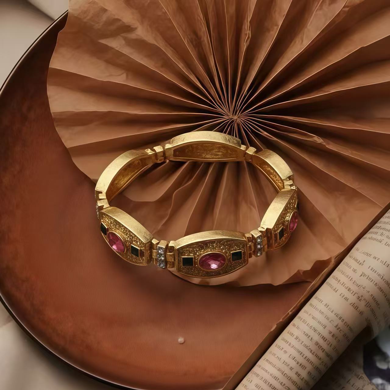 Antique-Gilt Relief Plaque · Zircon Bracelet